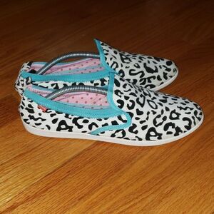 Dimmi cow print fabric slip-on flats
